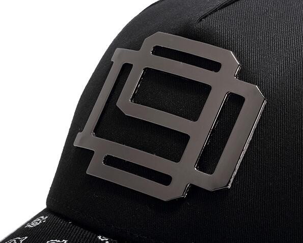 Baseball cap with metal element