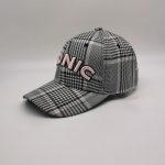 DH metal emblem checked baseball cap