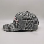 DH metal emblem checked baseball cap