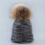 Melange knitted hat with pom
