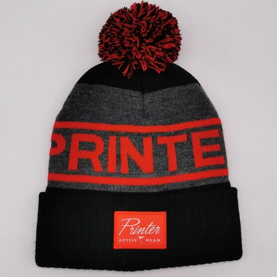 Grey jacquard knitted beanie with pompom