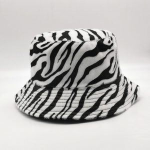Zebra print short fur with cotton twill reversible bucket hat. Hat size 58cm.