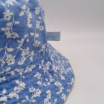 Washed cotton canvas floral allover print reversible bucket hat