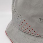Light grey laser cut out floppy silver TPU branding bucket hat