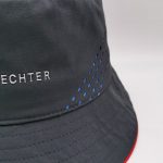 Charcoal laser cut out floppy silver TPU branding bucket hat